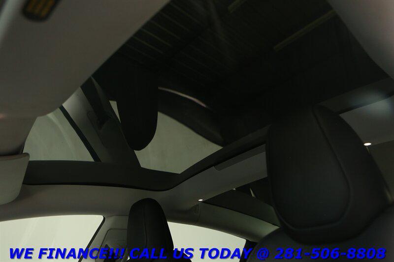 used 2025 Tesla Model 3 car, priced at $34,995