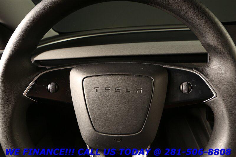 used 2025 Tesla Model 3 car, priced at $34,995