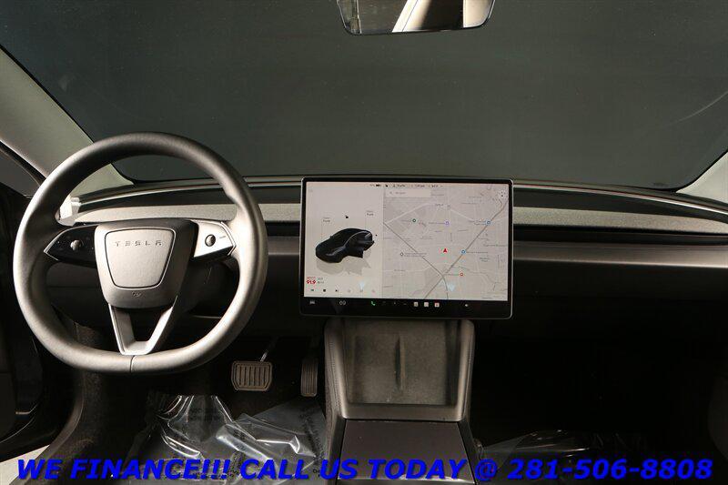 used 2025 Tesla Model 3 car, priced at $34,995