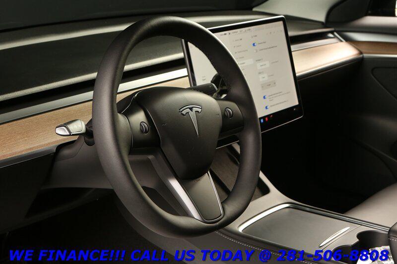 used 2023 Tesla Model 3 car, priced at $23,995