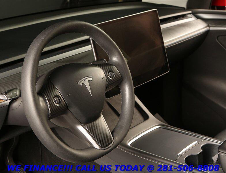 used 2023 Tesla Model Y car, priced at $30,995