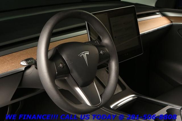 used 2024 Tesla Model Y car, priced at $33,995