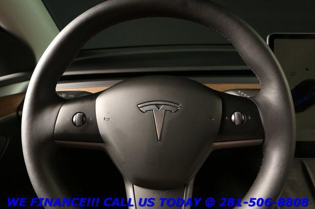 used 2024 Tesla Model Y car, priced at $33,995