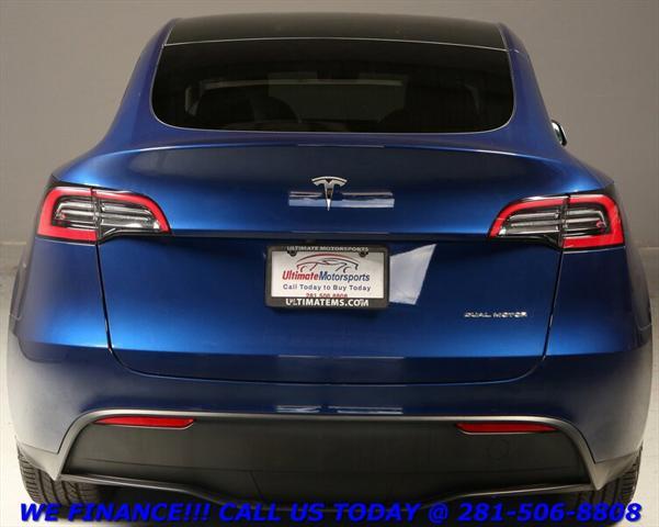 used 2024 Tesla Model Y car, priced at $33,995