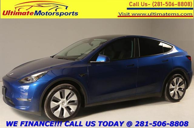 used 2024 Tesla Model Y car, priced at $33,995