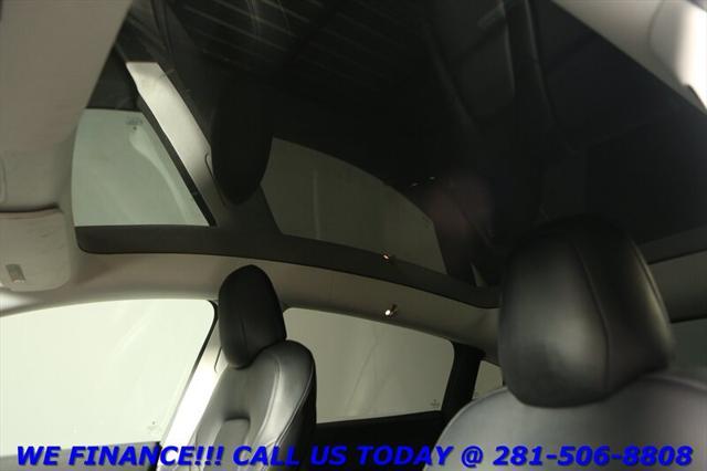 used 2024 Tesla Model Y car, priced at $33,995