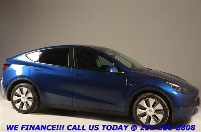 used 2024 Tesla Model Y car, priced at $33,995