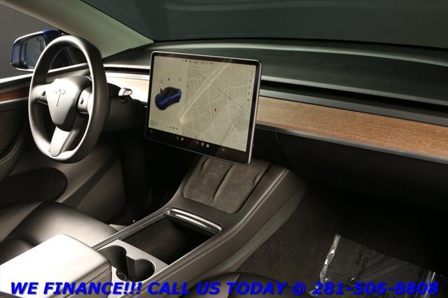 used 2024 Tesla Model Y car, priced at $33,995