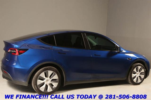 used 2024 Tesla Model Y car, priced at $33,995
