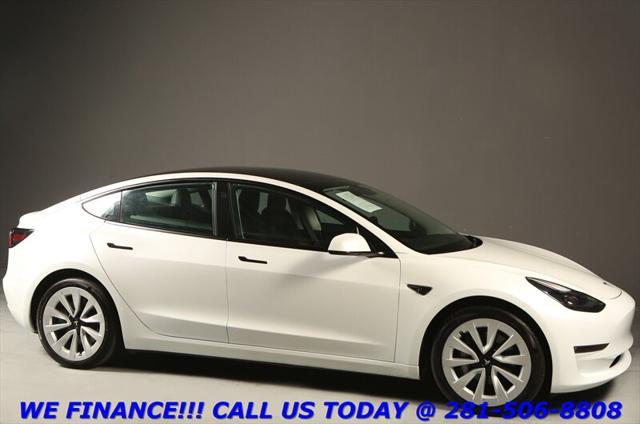 used 2022 Tesla Model 3 car, priced at $26,995