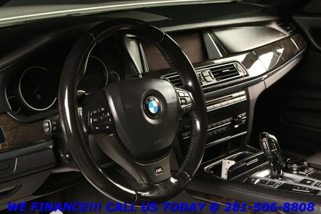 used 2015 BMW 750 car, priced at $15,995