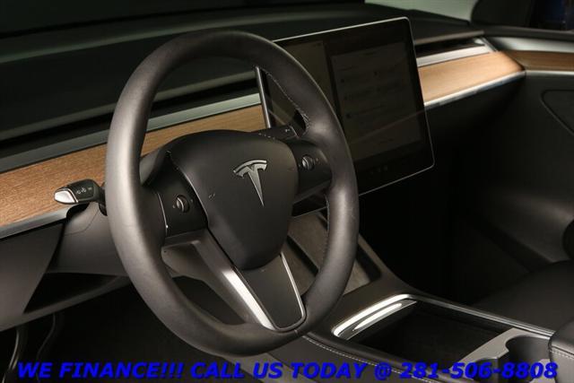 used 2023 Tesla Model Y car, priced at $30,995