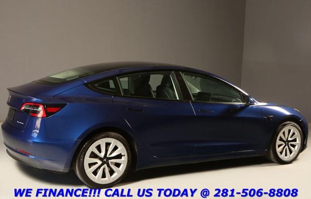 used 2023 Tesla Model 3 car, priced at $27,495