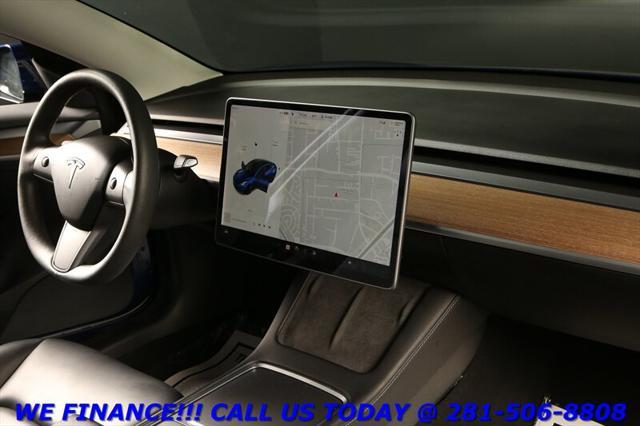 used 2023 Tesla Model 3 car, priced at $27,495