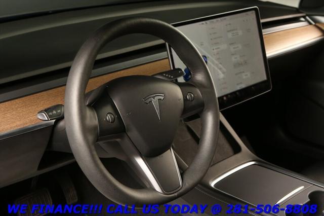 used 2023 Tesla Model 3 car, priced at $27,495