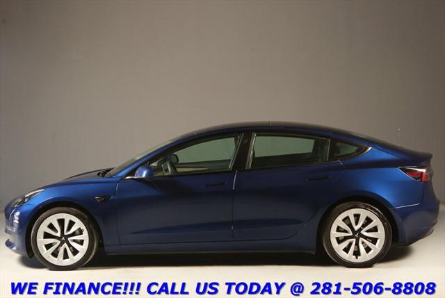used 2023 Tesla Model 3 car, priced at $27,495