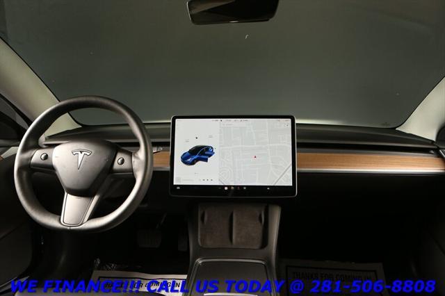 used 2023 Tesla Model 3 car, priced at $27,495