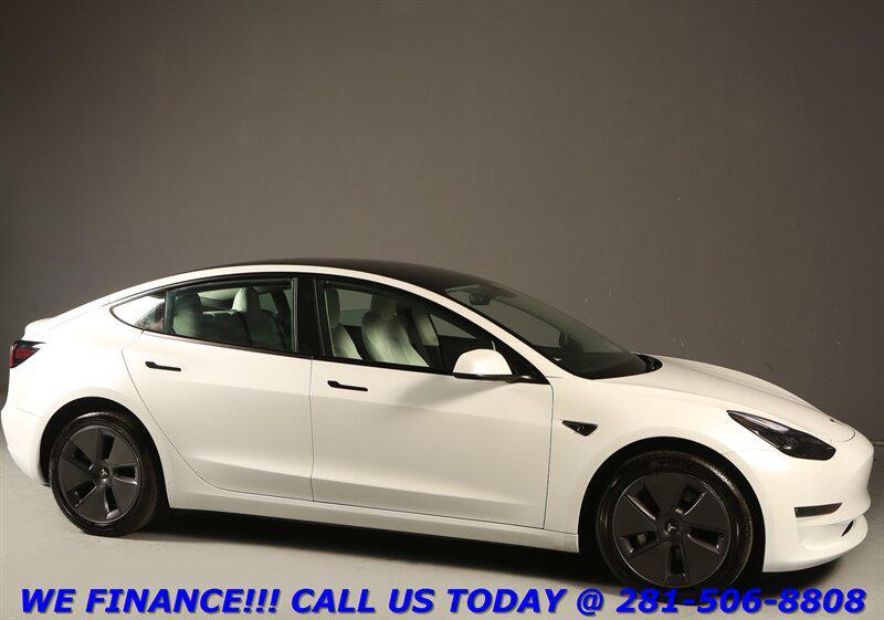 used 2023 Tesla Model 3 car, priced at $23,995