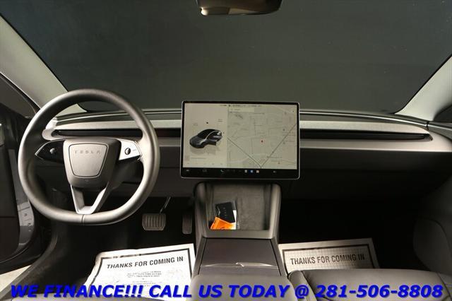 used 2024 Tesla Model 3 car, priced at $33,995