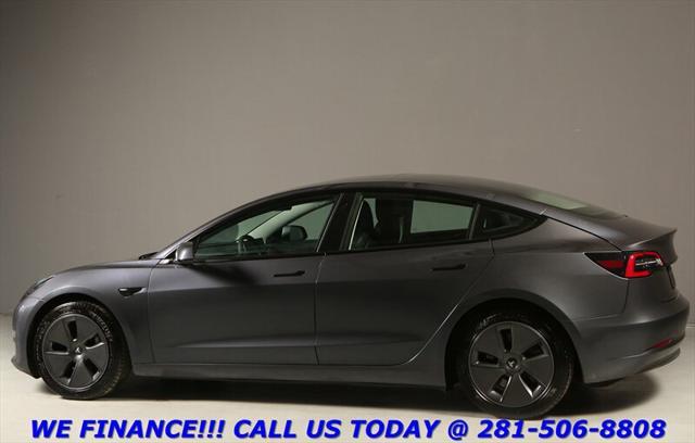 used 2023 Tesla Model 3 car, priced at $27,995