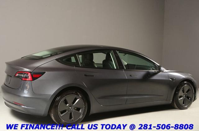 used 2023 Tesla Model 3 car, priced at $27,995