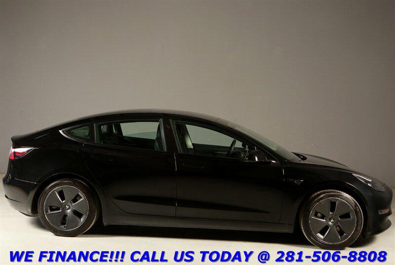used 2023 Tesla Model 3 car, priced at $23,995