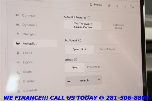 used 2025 Tesla Model 3 car, priced at $36,995