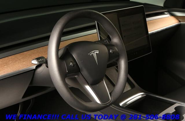 used 2023 Tesla Model Y car, priced at $30,995