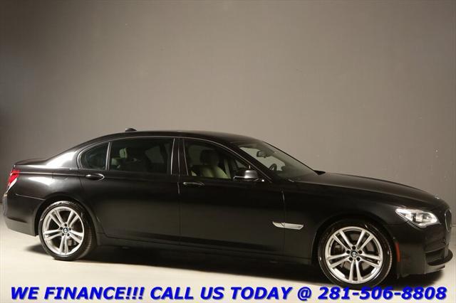 used 2015 BMW 750 car, priced at $16,795