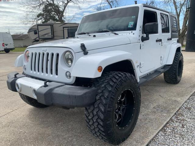 used 2015 Jeep Wrangler Unlimited car, priced at $20,199