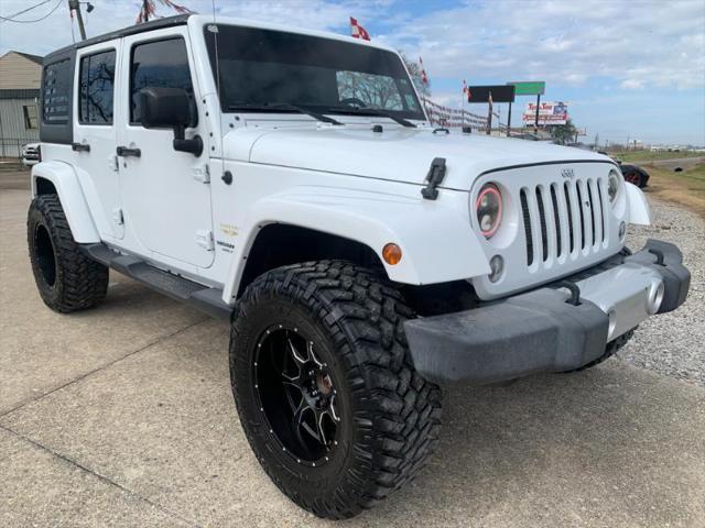 used 2015 Jeep Wrangler Unlimited car, priced at $20,199