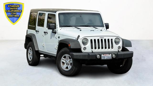 used 2015 Jeep Wrangler Unlimited car, priced at $16,500