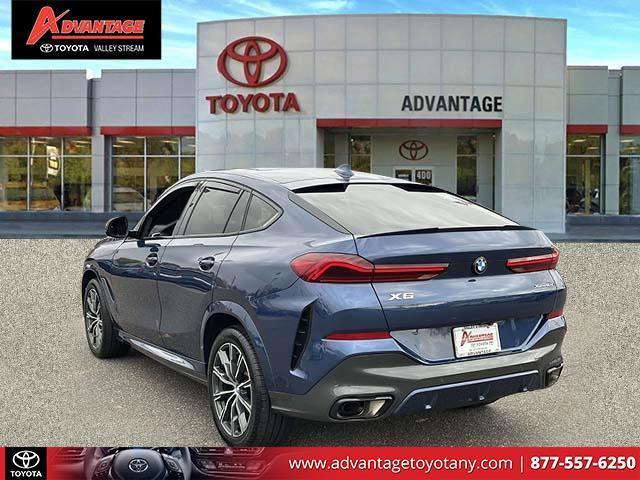 used 2023 BMW X6 car, priced at $54,900