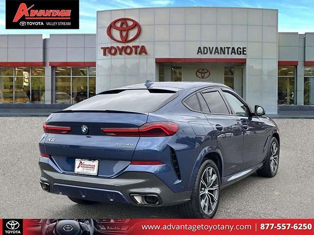 used 2023 BMW X6 car, priced at $54,900