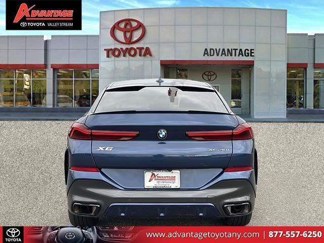 used 2023 BMW X6 car, priced at $54,900