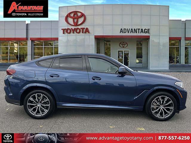 used 2023 BMW X6 car, priced at $54,900