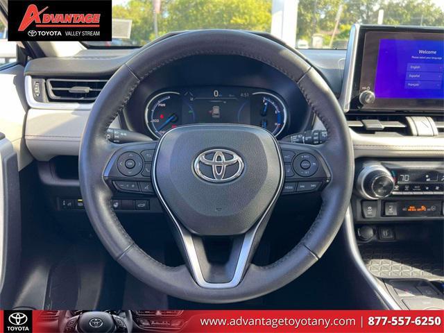 used 2023 Toyota RAV4 Hybrid car, priced at $30,000