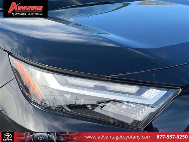 used 2023 Toyota RAV4 Hybrid car, priced at $30,000