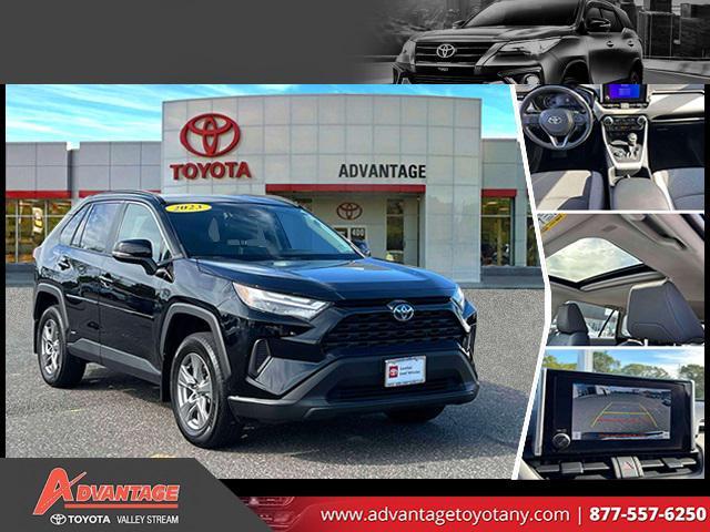used 2023 Toyota RAV4 Hybrid car, priced at $30,000