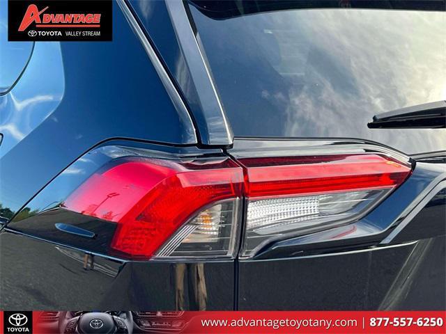 used 2023 Toyota RAV4 Hybrid car, priced at $30,000