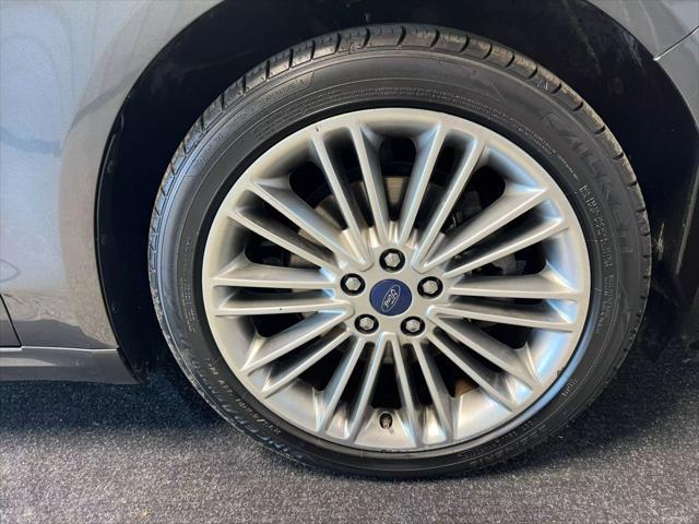 used 2015 Ford Fusion car, priced at $13,995