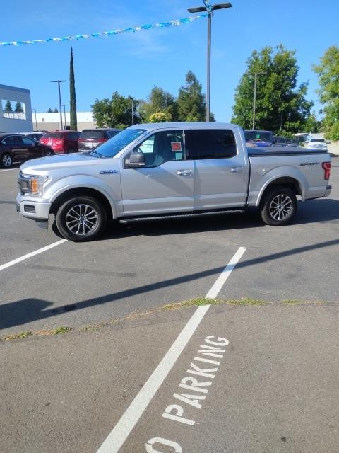 used 2018 Ford F-150 car, priced at $21,977