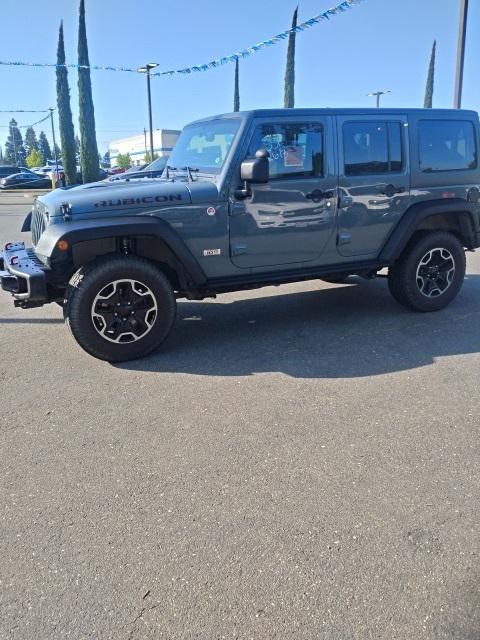 used 2013 Jeep Wrangler Unlimited car, priced at $19,977