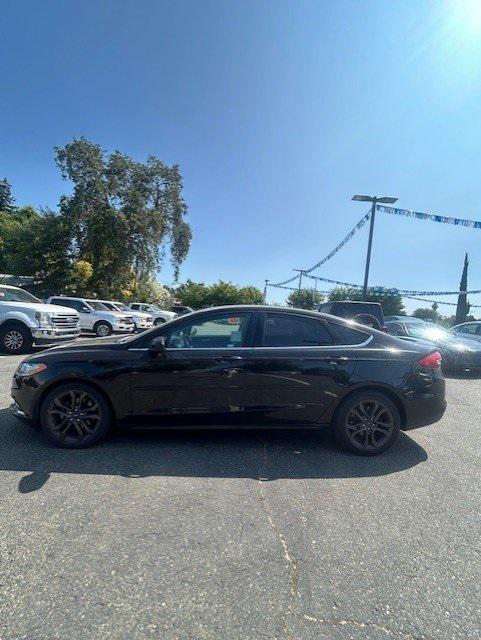 used 2018 Ford Fusion car, priced at $12,977