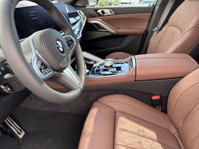 new 2025 BMW X6 car, priced at $91,975