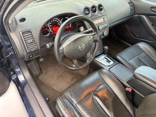 used 2010 Nissan Altima car, priced at $6,999
