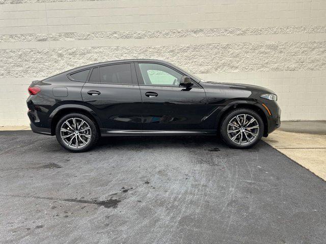 new 2025 BMW X6 car, priced at $77,875