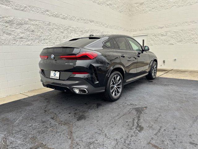 new 2025 BMW X6 car, priced at $77,875