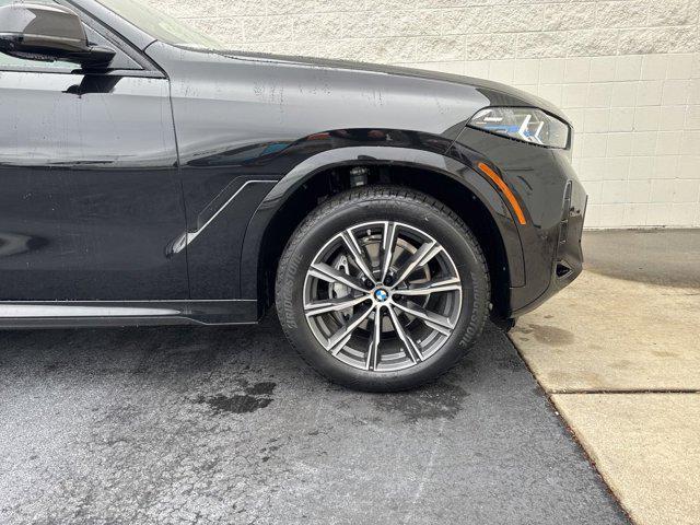 new 2025 BMW X6 car, priced at $77,875