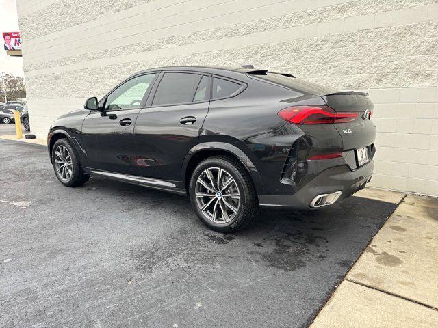 new 2025 BMW X6 car, priced at $77,875